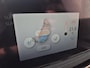 Nissan Ariya Evolve 66 kWh / 99% SOH / Glazen schuif- en kanteldak / CCS snelladen / warmtepomp / Stuur- Stoel & Achterbank verwarming / Head Up Display / Adaptief cruise control / Stoelventilatie / Bose Audio Systeem / Elektrische achterklep / Draadloze telefoon lader /