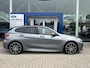 BMW 1-Serie 118i Executive | M-Sport | 19-Inch | BMW-Individual Frozen Grey | Panodak | Stoelverwarming | Camera | Cruise Control | Lederen Bekleding | Dealeronderhouden