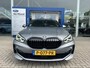 BMW 1-Serie 118i Executive | M-Sport | 19-Inch | BMW-Individual Frozen Grey | Panodak | Stoelverwarming | Camera | Cruise Control | Lederen Bekleding | Dealeronderhouden