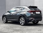 Hyundai Tucson 1.6 T-GDI HEV AWD Premium Edition / Uniek 4WD / Dealer onderhouden / 1.650 kg trekgewicht / Leder / Elektrische klep / Stoelventilatie / Stuur-, stoel- & achterbankverwarming / 19" LM wielen & All Season banden /