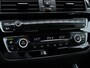 BMW 1-Serie 116i Corporate Lease High Executive | Stoelverwarming | Parkeersensoren voor & achter | Lederen bekleding | DAB Ontvanger | Climate controle |