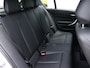 BMW 1-Serie 116i Corporate Lease High Executive | Stoelverwarming | Parkeersensoren voor & achter | Lederen bekleding | DAB Ontvanger | Climate controle |