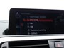 BMW 1-Serie 116i Corporate Lease High Executive | Stoelverwarming | Parkeersensoren voor & achter | Lederen bekleding | DAB Ontvanger | Climate controle |