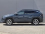 Hyundai Tucson 1.6 T-GDI PHEV Premium 4WD / Dealer onderhouden / All season banden / Elektrische achterklep / Stuur- Stoel & Achterbank verwarming / Trekgewicht 1350 kg / Stoelventilatie / Adaptief cruise control / Rondomzicht camera / Apple Carplay Android Auto / Keyless Entry/Start /