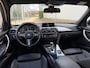 BMW 3-Serie 320i High Executive | NL-auto/1e eign./Leder/Sportstoelen/Navi/PDC