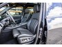 BMW X5 xDrive50e - M Sport Pro | Skylounge | B&W | Kuipstoelen | Luchtvering