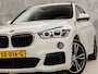 BMW X1 sDrive20i M Sport High Executive 192Pk Automaat (PANORAMADAK, M PAKKET, DEALER ONDERHOUDEN, GROOT NAVI, HEAD-UP DISPLAY, HARMAN/KARDON, ELEK SPORTSTOELEN, CAMERA, ELEK ACHTERKLEP, STOELVERWARMING, NIEUWSTAAT)