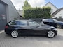 BMW 3-Serie Touring 320d Upgrade Edition | Navigatie | Lederen Bekleding | Airco | Lichtmetalen Velgen |