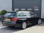 BMW 3-Serie Touring 320d Upgrade Edition | Navigatie | Lederen Bekleding | Airco | Lichtmetalen Velgen |