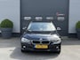 BMW 3-Serie Touring 320d Upgrade Edition | Navigatie | Lederen Bekleding | Airco | Lichtmetalen Velgen |
