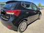 Hyundai ix20 1.4i i-Motion ✅Stoelverw.✅Clima✅Cruise✅Speed lim.✅