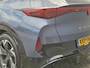 CUPRA Tavascan Business 82 kWh / Fabrieksgarantie t/m 8-2027 / SOH 100% / All season banden / CCS snelladen / Elektrische achterklep / Warmtepomp / Stuur- Stoel & Voorruit verwarming / Achteruitrijcamera / Adaptief cruise control / Keyless Entry/Start / Apple Carplay Android Auto / Climate control /