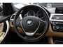 BMW 3-Serie 320i Corporate Lease High Executive / Trekhaak / Schuifdak / Leder / Navigatie / Parkeerhulp V+A / 16'' / Getint glas / Stoelverwarming / Cruise Control