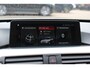 BMW 3-Serie 320i Corporate Lease High Executive / Trekhaak / Schuifdak / Leder / Navigatie / Parkeerhulp V+A / 16'' / Getint glas / Stoelverwarming / Cruise Control