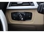 BMW 3-Serie 320i Corporate Lease High Executive / Trekhaak / Schuifdak / Leder / Navigatie / Parkeerhulp V+A / 16'' / Getint glas / Stoelverwarming / Cruise Control