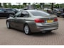 BMW 3-Serie 320i Corporate Lease High Executive / Trekhaak / Schuifdak / Leder / Navigatie / Parkeerhulp V+A / 16'' / Getint glas / Stoelverwarming / Cruise Control