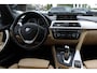 BMW 3-Serie 320i Corporate Lease High Executive / Trekhaak / Schuifdak / Leder / Navigatie / Parkeerhulp V+A / 16'' / Getint glas / Stoelverwarming / Cruise Control
