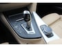 BMW 3-Serie 320i Corporate Lease High Executive / Trekhaak / Schuifdak / Leder / Navigatie / Parkeerhulp V+A / 16'' / Getint glas / Stoelverwarming / Cruise Control