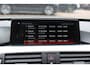 BMW 3-Serie 320i Corporate Lease High Executive / Trekhaak / Schuifdak / Leder / Navigatie / Parkeerhulp V+A / 16'' / Getint glas / Stoelverwarming / Cruise Control