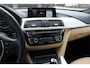 BMW 3-Serie 320i Corporate Lease High Executive / Trekhaak / Schuifdak / Leder / Navigatie / Parkeerhulp V+A / 16'' / Getint glas / Stoelverwarming / Cruise Control