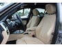 BMW 3-Serie 320i Corporate Lease High Executive / Trekhaak / Schuifdak / Leder / Navigatie / Parkeerhulp V+A / 16'' / Getint glas / Stoelverwarming / Cruise Control