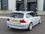 BMW 3-Serie Touring 318i TOURING XENON/LEDER/NAVIGATIE! NIEUWE DISTRIBUTIEKETTING!