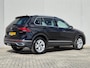 Volkswagen Tiguan 1.4 TSI eHybrid R-Line Business+ / Elektrische trekhaak / Trekgewicht 1.800 kg / Rondomzicht camera / Stuur- & Stoelverwarming / Elektrische achterklep / Voorstoelen met massage functie / Draadloze telefoon lader /