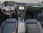 Volkswagen Tiguan 1.4 TSI eHybrid R-Line Business+ / Elektrische trekhaak / Trekgewicht 1.800 kg / Rondomzicht camera / Stuur- & Stoelverwarming / Elektrische achterklep / Voorstoelen met massage functie / Draadloze telefoon lader /