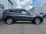 BMW X1 XDrive20i High Executive / Airco / Navi / Cruise control / Achteruitrij camera / Afneembare trekhaak /