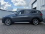 BMW X1 XDrive20i High Executive / Airco / Navi / Cruise control / Achteruitrij camera / Afneembare trekhaak /