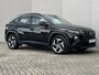 Hyundai Tucson 1.6 T-GDI PHEV Comfort AWD / Dealer onderhouden / Accu SoH 100 % / Fabrieksgarantie tot 04-2028 / Navigatie / Stoelverwarming / Apple Carplay Android / 19" LM wielen /