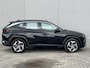 Hyundai Tucson 1.6 T-GDI PHEV Comfort AWD / Dealer onderhouden / Accu SoH 100 % / Fabrieksgarantie tot 04-2028 / Navigatie / Stoelverwarming / Apple Carplay Android / 19" LM wielen /