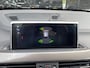 BMW X1 xDrive20i High Executive X-line Trekhaak Navigatie Zwart Leder Stoelverwarming 19 Inch Velgen Parkeersensoren Led Koplampen Elektrische Achterklep Sportstoelen 8-traps Automaat 2000 kg geremd trekgewicht !