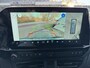 Ford Tourneo Custom 340 2.5 PHEV L2H1 Titanium X 233pk | 16-weg elek. AGR-stoel | Handsfree elek. dubbele zijschuifdeuren | Panoramadak | 15 B&O speaker | Inklapbare trekhaak | Verwarmbaar stuurwiel | Verwarmbare en elek. verstelbare stoelen tweede zitrij | Draadloos opladen | Prijs ex. BTW incl. BPM |  Prijs Incl. BTW en BPM 70.400