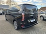 Ford Tourneo Custom 340 2.5 PHEV L2H1 Titanium X 233pk | 16-weg elek. AGR-stoel | Handsfree elek. dubbele zijschuifdeuren | Panoramadak | 15 B&O speaker | Inklapbare trekhaak | Verwarmbaar stuurwiel | Verwarmbare en elek. verstelbare stoelen tweede zitrij | Draadloos opladen | Prijs ex. BTW incl. BPM |  Prijs Incl. BTW en BPM 70.400