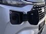Ford Tourneo Custom 340 2.5 PHEV L2H1 Titanium X 233pk | 16-weg elek. AGR-stoel | Handsfree elek. dubbele zijschuifdeuren | Panoramadak | 15 B&O speaker | Inklapbare trekhaak | Verwarmbaar stuurwiel | Verwarmbare en elek. verstelbare stoelen tweede zitrij | Draadloos opladen | Prijs ex. BTW incl. BPM | Prijs Incl. BTW en BPM 70.400