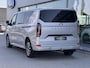 Ford Tourneo Custom 340 2.5 PHEV L2H1 Titanium X 233pk | 16-weg elek. AGR-stoel | Handsfree elek. dubbele zijschuifdeuren | Panoramadak | 15 B&O speaker | Inklapbare trekhaak | Verwarmbaar stuurwiel | Verwarmbare en elek. verstelbare stoelen tweede zitrij | Draadloos opladen | Prijs ex. BTW incl. BPM | Prijs Incl. BTW en BPM 70.400