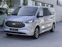 Ford Tourneo Custom 340 2.5 PHEV L2H1 Titanium X 233pk | 16-weg elek. AGR-stoel | Handsfree elek. dubbele zijschuifdeuren | Panoramadak | 15 B&O speaker | Inklapbare trekhaak | Verwarmbaar stuurwiel | Verwarmbare en elek. verstelbare stoelen tweede zitrij | Draadloos opladen | Prijs ex. BTW incl. BPM | Prijs Incl. BTW en BPM 70.400