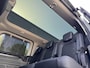 Ford Tourneo Custom 340 2.5 PHEV L2H1 Titanium X 233pk | 16-weg elek. AGR-stoel | Handsfree elek. dubbele zijschuifdeuren | Panoramadak | 15 B&O speaker | Inklapbare trekhaak | Verwarmbaar stuurwiel | Verwarmbare en elek. verstelbare stoelen tweede zitrij | Draadloos opladen | Prijs ex. BTW incl. BPM | Prijs Incl. BTW en BPM 70.400