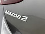 Mazda 2 1.5 Skyactiv-G Dynamic+ 90Pk | Navigatie | Airco | Cruise Control & Snelheidsbegrenzer | Bluetooth Telefoon Voorbereiding | Parkeersensoren Achter | Privacy Glass | Lichtmetalen Velgen |