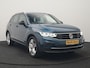 Volkswagen Tiguan 1.4 TSI eHybrid Active PHEV 245pk Dealer O.H. | Trekhaak Af Fabriek | Adaptive Cruise | Head Up | IQ Light | Keyless | Blis | Sportstoelen & Stuur Verwarmd | Sfeerverlichting | Apple Carplay | Navigate | DAB | 19"L.M | Plug In Hybrid |