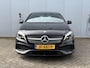 Mercedes-Benz A-klasse 180 Ambition AMG Line | Facelift | Panoramadak | Stoelverwarming | Navigatie | AMG styling | 18” lichtmetalen velgen | Bluetooth | Dynamic Select rijmodi | Cruise Control | Verstelbare lendensteun | Sportstoelen | Volledig onderhouden