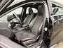 Mercedes-Benz A-klasse 180 Ambition AMG Line | Facelift | Panoramadak | Stoelverwarming | Navigatie | AMG styling | 18” lichtmetalen velgen | Bluetooth | Dynamic Select rijmodi | Cruise Control | Verstelbare lendensteun | Sportstoelen | Volledig onderhouden