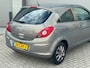 Opel Corsa 1.2-16V 3D AUT 2010 Bruin NAP|AIRCO|CRUISE