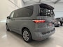 Volkswagen Multivan 1.4 eHybrid EDITION 7p. PANO/HEAD-UP/LEER/360CAMERA/SOH 94%/STANDKACHEL/ACC/IQ-LIGHT/ELECTR.SCHUIFDEUREN/SFEER/KEYLESS/CARPLAY/EL.A.KLEP/18"/PURE-GREY/NET OH BEURT GEHAD, VOLLEDIG VW DEALER HISTORIE
