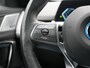 BMW iX1 xDrive30 67 kWh 313pk Dealer O.H. | Trekhaak Af Fabriek | Panodak | Adaptive Cruise | Head Up | 360 Camera | Harman / Kardon | Adaptief Onderstel | Lederen Sportstoelen Massage & Verwarmd | Stuur Verwarmd | Hifi Audio | Keyless | Blis |