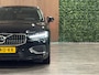 Volvo V60 T8 AWD Recharge Plus Bright | Schuifdak | Trekhaak | 455pk | Adaptieve Cruise Control | Stoelverwarming voor+achter | Stuurwielverwarming | Full LED Meesturende koplampen | Pilot Assist | BLIS Dode Hoek Detectie | Parkeercamera | Elektrische voorstoelen geheugen | Lederen bekleding | Zitting verlenging voorstoelen | 18 Inch | Google Infotainment | Keyless Drive | Parkeersensoren voor+achter | Privacy Glass | Elektrisch bedienbare achterklep | DAB Radio | Apple Carplay/Android Auto | Volvo On Call met mobiele App functie | Onyx Black Metallic |