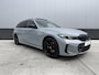BMW 3-Serie Touring 320e M Sport | SOH 97% | Panorama | Trekhaak | Apple Carplay - Android Auto | Sfeerverlichting | Brooklyn Grau