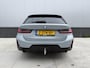 BMW 3-Serie Touring 320e M Sport | SOH 97% | Panorama | Trekhaak | Apple Carplay - Android Auto | Sfeerverlichting | Brooklyn Grau