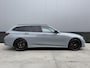 BMW 3-Serie Touring 320e M Sport | SOH 97% | Panorama | Trekhaak | Apple Carplay - Android Auto | Sfeerverlichting | Brooklyn Grau